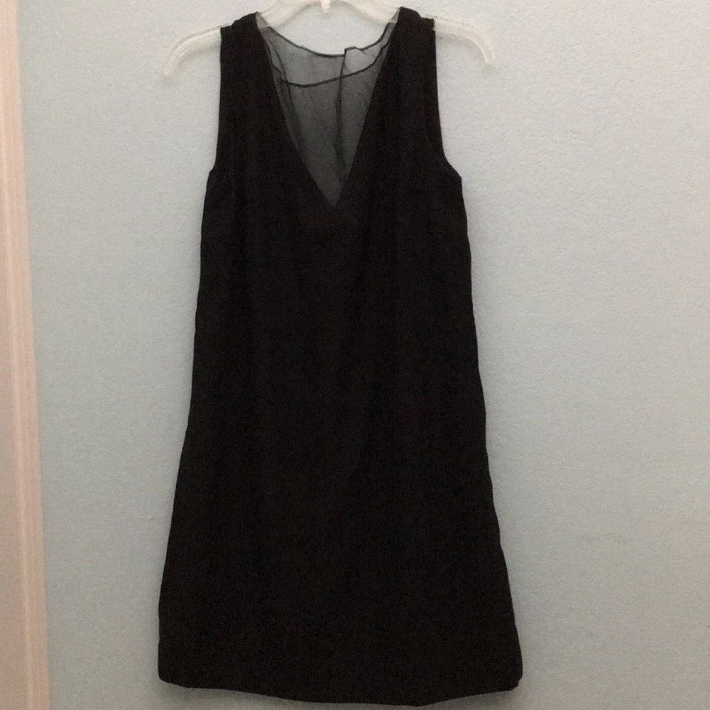 Black sleeveless dress with v cut